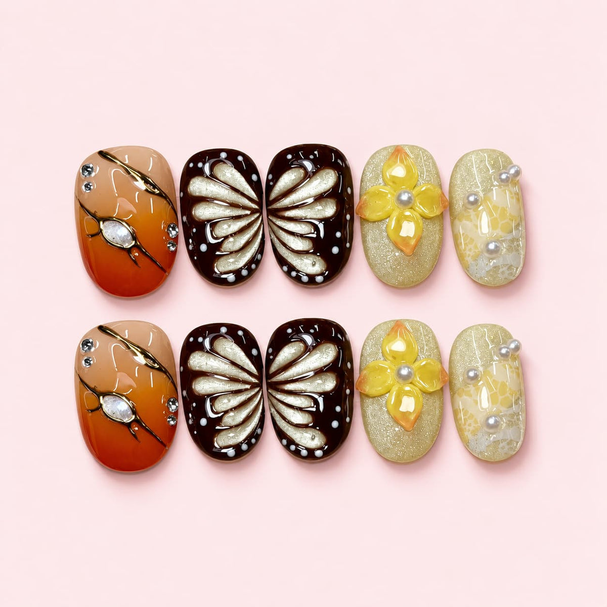 Amber Wing short press-on nails in cocoa and champagne with fanned butterfly wing panels and pearl accents