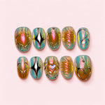 Aurora Heart short press-on nails with a pink gold and mint shifting base, silver-toned hearts and four-point stars