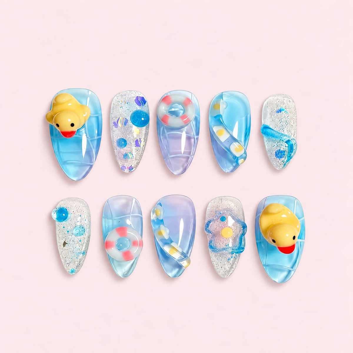 Blue 3D Rubber Duck Almond Press-On Nails with translucent blue jelly, glitter, rubber duck charms, life rings and water droplets