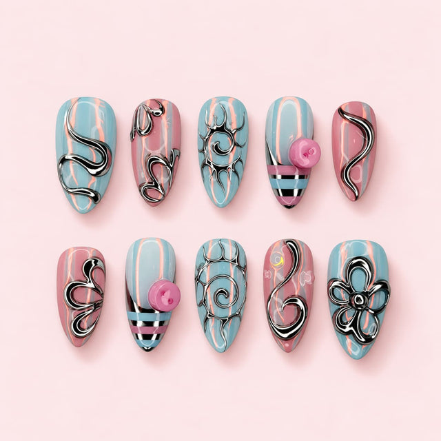Candy Swirl almond press-on nails in baby blue and pink stripes with raised silver swirls, flowers and studs