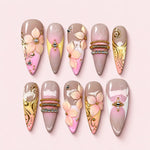 Gilded Petal stiletto press-on nails in taupe and blush with 3D peach flowers, gold-toned scrollwork and beaded bands