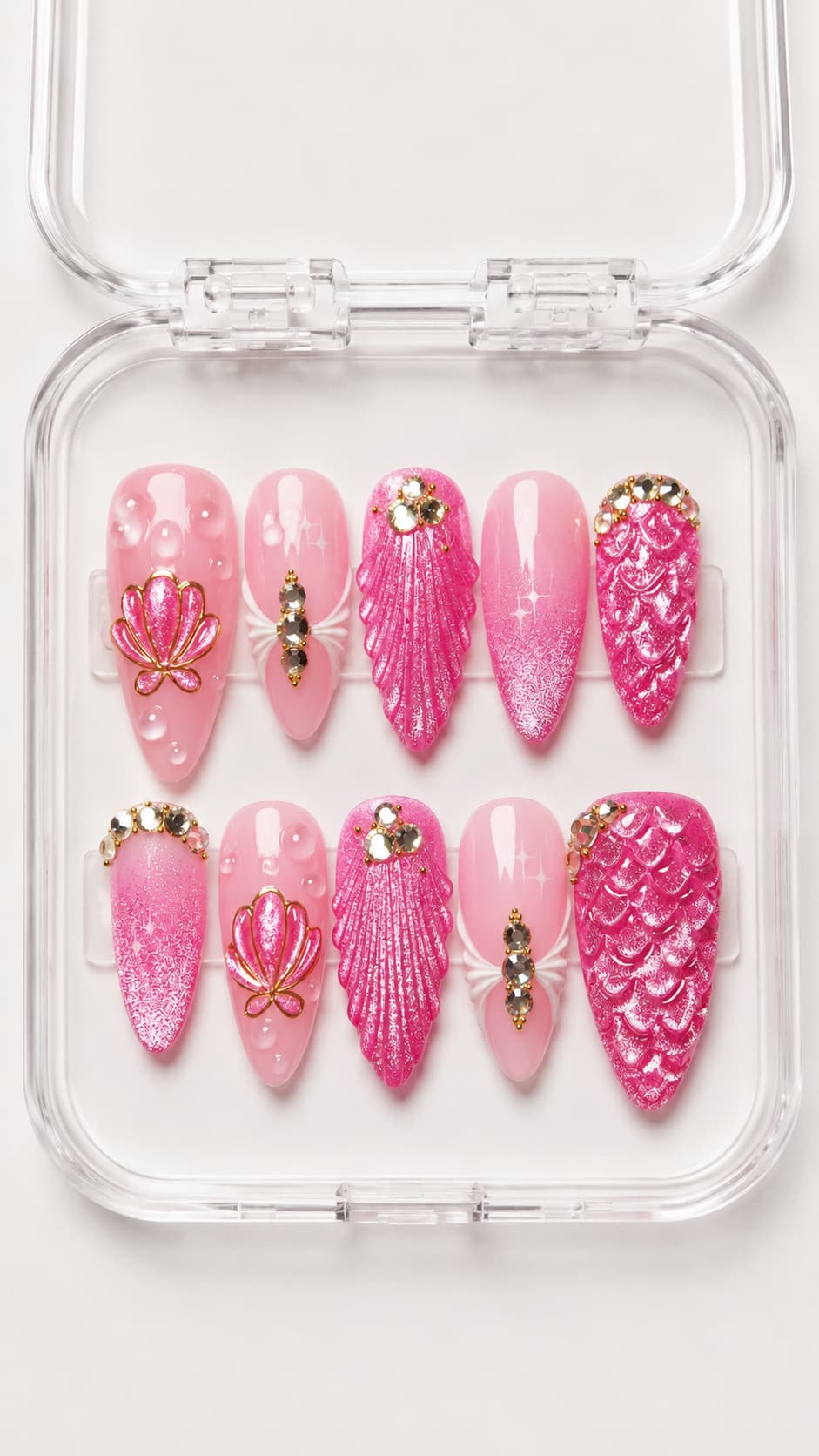 Hot Pink Mermaid Seashell Almond Press-On Nails with 3D seashells, mermaid scales, gold outlines, gemstones and pearl bubbles