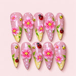 Ladybug Garden stiletto press-on nails in soft pink with sculpted cherry blossoms, 3D ladybugs and bees