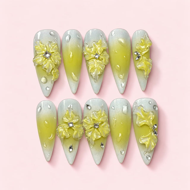 Lemon Ruffle stiletto press-on nails in silver white and lemon yellow with ruffled sculpted flowers and clear stones