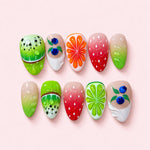 Orchard Slice short almond press-on nails with carved kiwi, strawberry, citrus and lime and sculpted blueberries