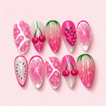 Pink Orchard almond press-on nails with sculpted pink cherries and grapes, carved strawberries and dragon fruit