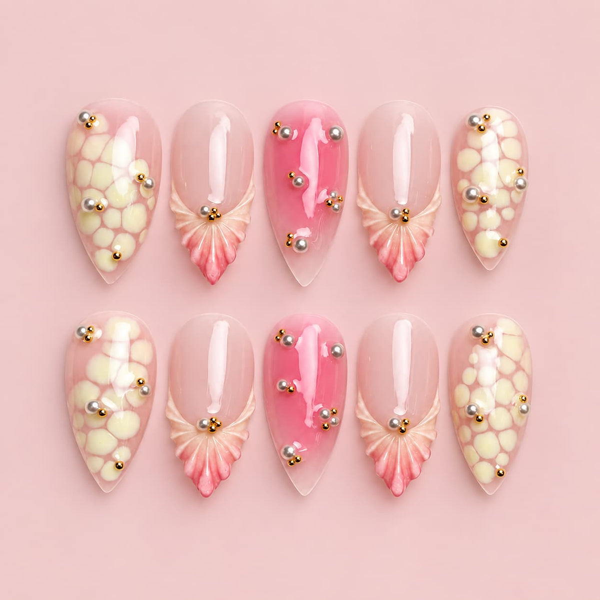Pink Snakeskin Seashell Almond Press-On Nails with pink gradient, snakeskin accents, 3D seashells, pearls and gold beads