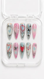 Silver Heart Butterfly Aura Stiletto Press-On Nails with pink-blue aura, silver hearts, butterflies and gemstone accents