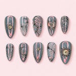 Slate Sigil almond press-on nails in storm grey with neon pink streaks and silver sun, moon and star line work