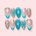 Turquoise Crest short almond press-on nails with turquoise wave tips, carved shells and clear stone clusters