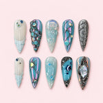 Blue Silver Opal 3D Ocean stiletto press-on nails with teal blue base, silver chrome, opal accents and sculpted jellyfish