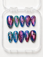 Cosmic Color-Shift Short Almond Press-On Nails with pink-blue-purple iridescent base, 3D swirls, silver lines, beads and star accents