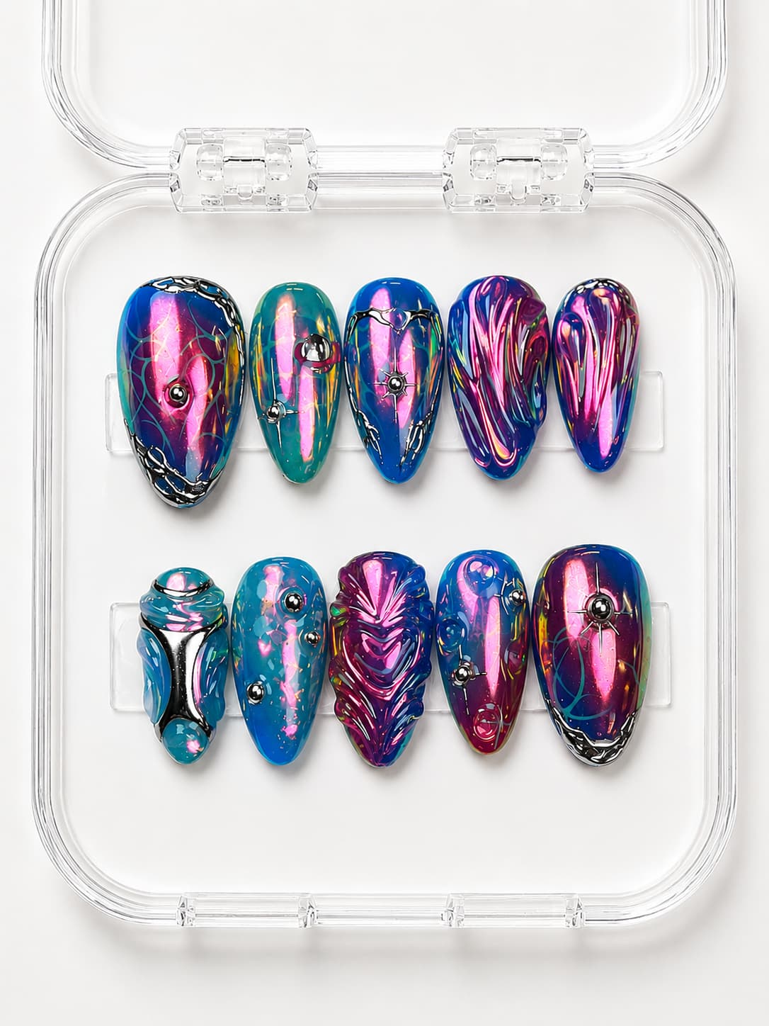 Cosmic Color-Shift Short Almond Press-On Nails with pink-blue-purple iridescent base, 3D swirls, silver lines, beads and star accents