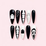 Ghost Halloween Stiletto Press-On Nails with black and white ghosts, skeleton bones, spider webs and 3D spooky details.