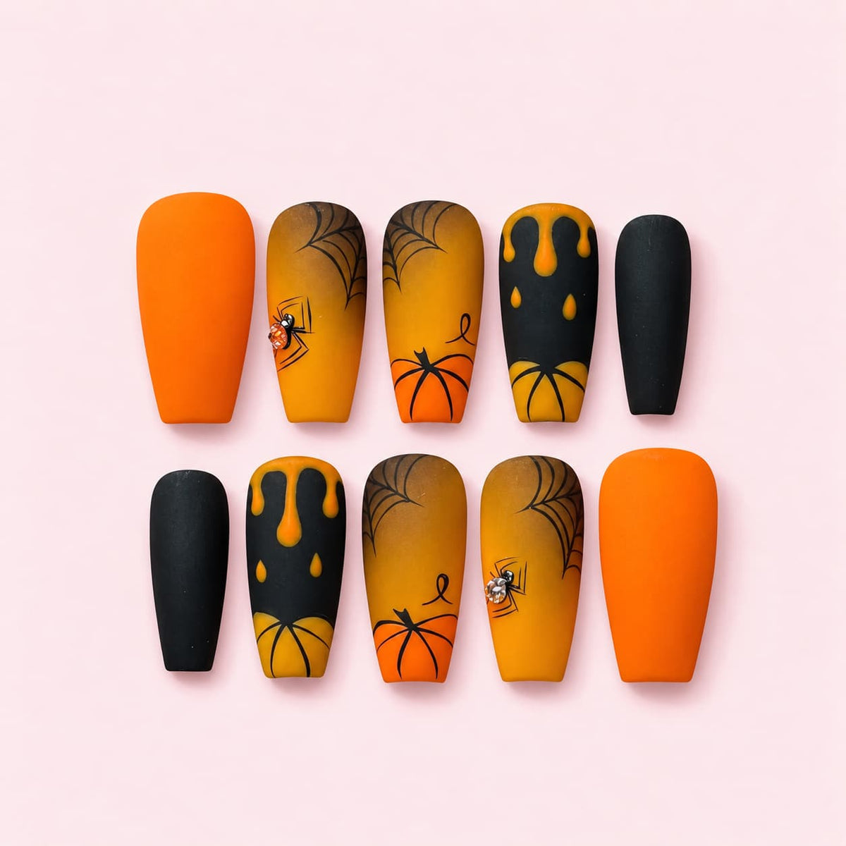 Halloween Pumpkin Spider Coffin Press-On Nails with orange and black matte designs, spider webs, pumpkins, drips, and rhinestone spiders.