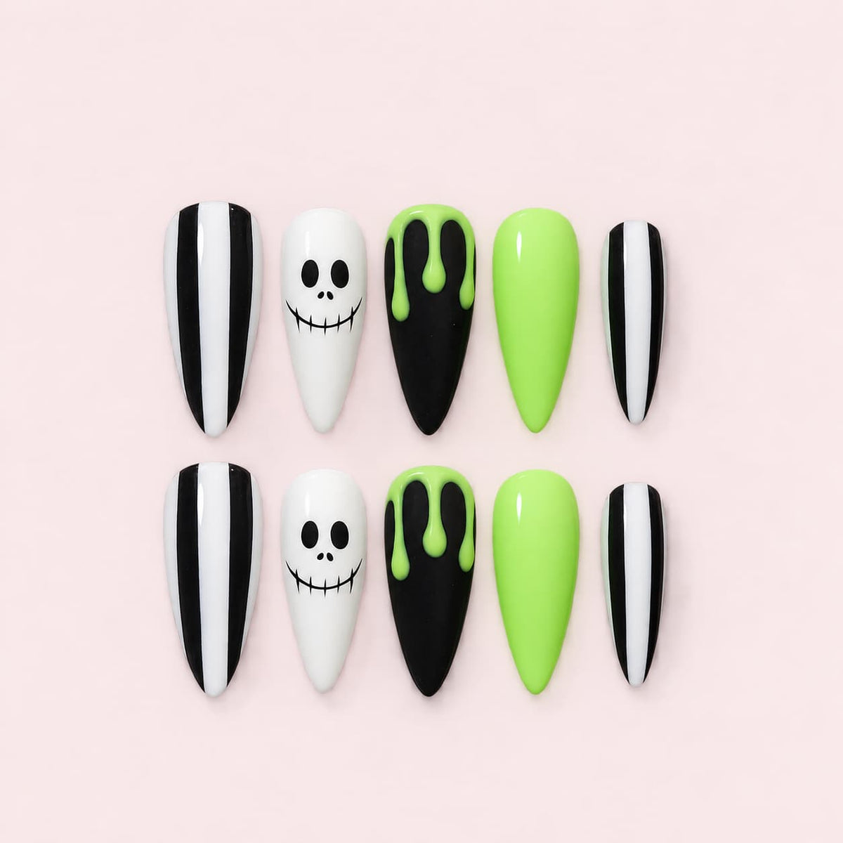Lime Slime Skeleton Stiletto Press-On Nails with black and white stripes, skeleton faces, neon green drips, and lime accent nails.