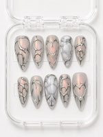 Opal Silver Almond Press-On Nails with pearl white shimmer, 3D silver hearts and swirls, gray marble accents and pearls
