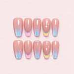 Pastel Aura French Tip Coffin Press-On Nails with blue, purple and pink ombré tips, pastel French lines, star accents, and gemstone details.