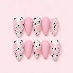 Pink Dalmatian Almond Press-On Nails with a milky white base, black spots, solid pink accent nails, and raised 3D pink jelly details.