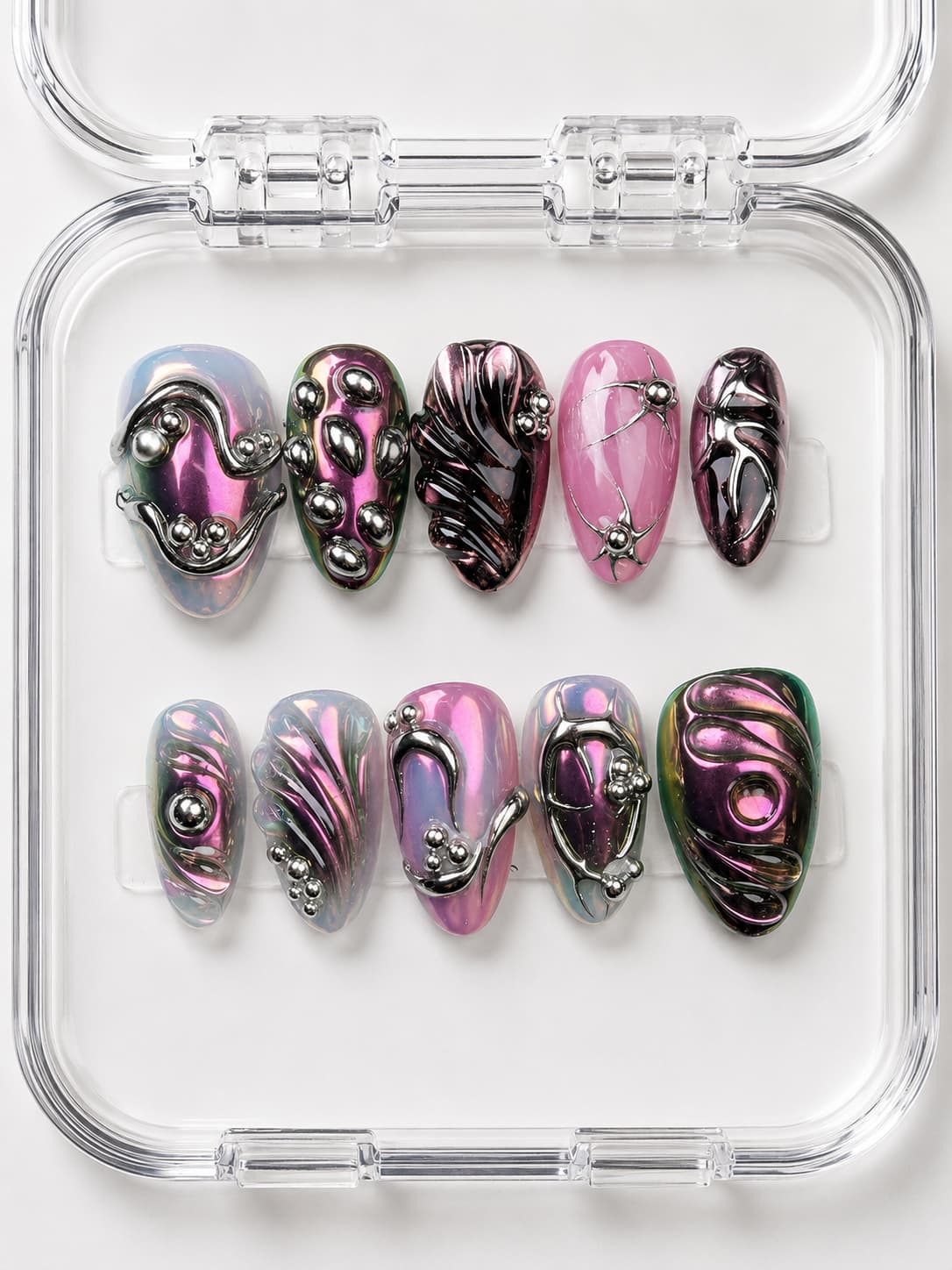 Pink Silver Metallic Almond Press-On Nails with iridescent pink-purple-green shift, molten silver swirls, 3D texture and silver beads