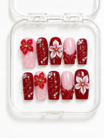Red Blossom Coffin Press-On Nails with deep red and soft pink color-block, 3D red and white flowers, pearls and gemstones