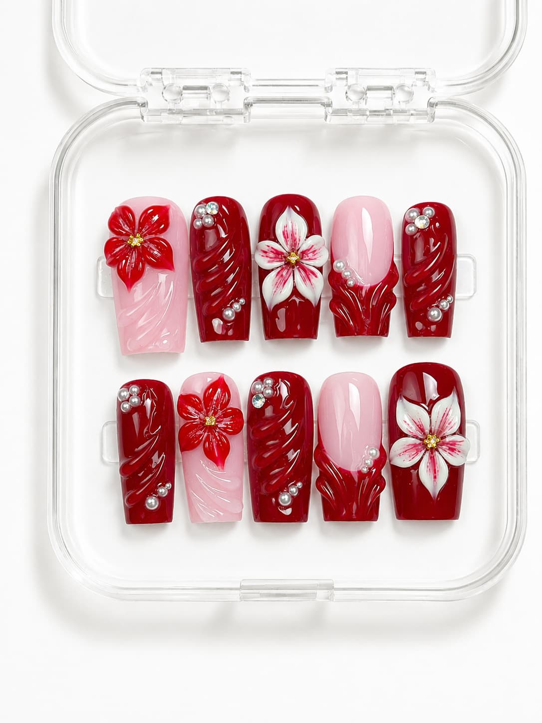 Red Blossom Coffin Press-On Nails with deep red and soft pink color-block, 3D red and white flowers, pearls and gemstones
