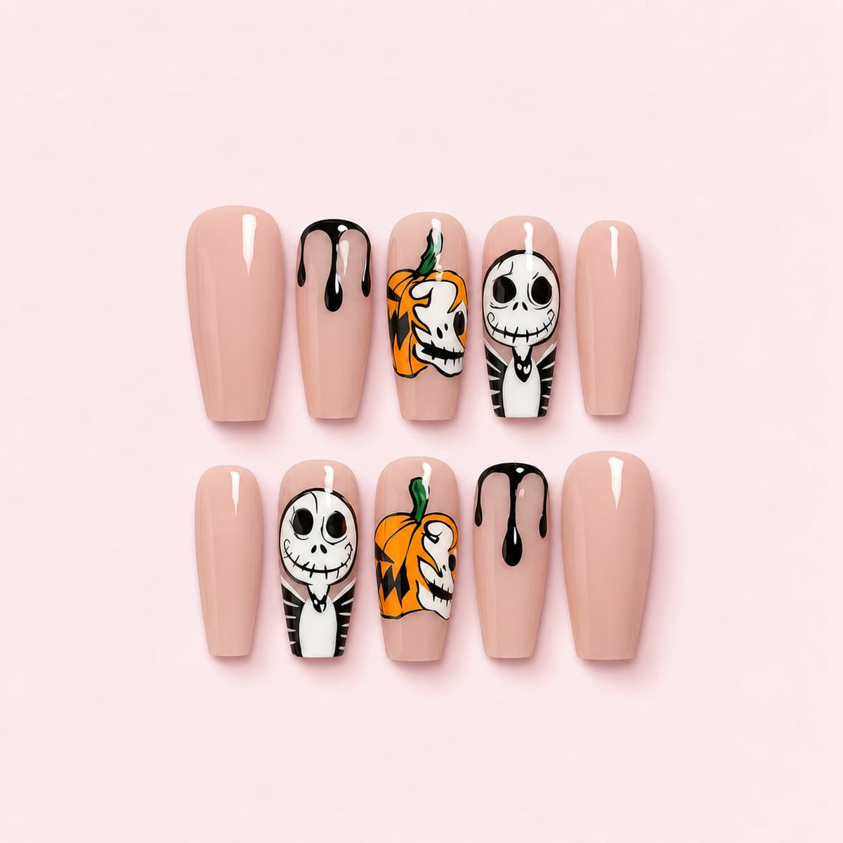 Spooky Skeleton Halloween Coffin Press-On Nails with hand-painted skeletons, jack-o'-lantern pumpkins, black drips, and a glossy nude base.