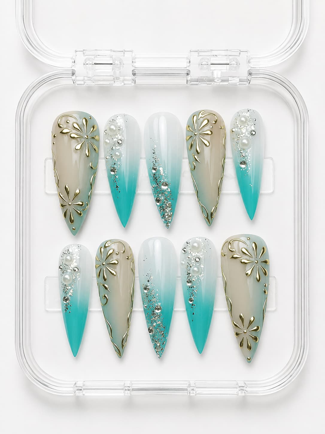 Teal Gold Floral Stiletto Press-On Nails with nude-to-teal gradient, 3D gold flowers, scrollwork, pearls, gemstones and silver glitter